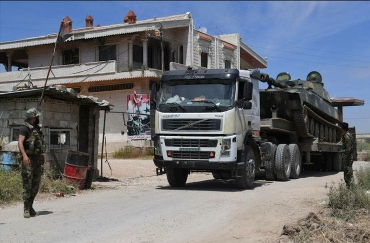 Las fuerzas del Ejército sirio ingresan a la ciudad de Kafr Nabudah, a unos 40 kilómetros al norte de Hama, 11 de mayo de 2019. /Foto: AFP