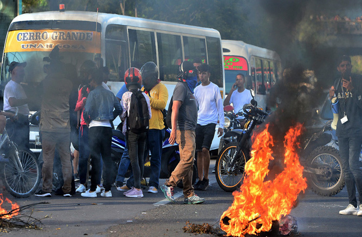Estudiantes de la Universidad Nacional Autónoma de Honduras protestan en Tegucigalpa el 19 de junio de 2019. /Foto: Orlando Sierra (AFP)