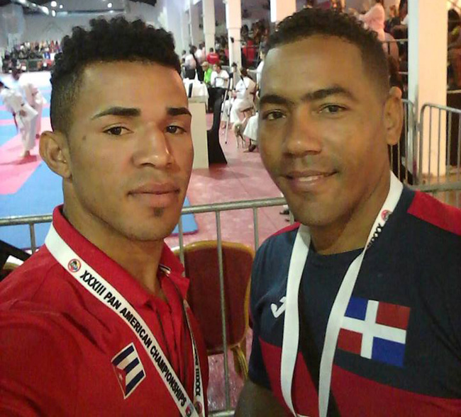 Yunieski junto al atleta cubano Darián Díaz en el Panamericano del deporte. / Foto: cortesía del entrevistado
