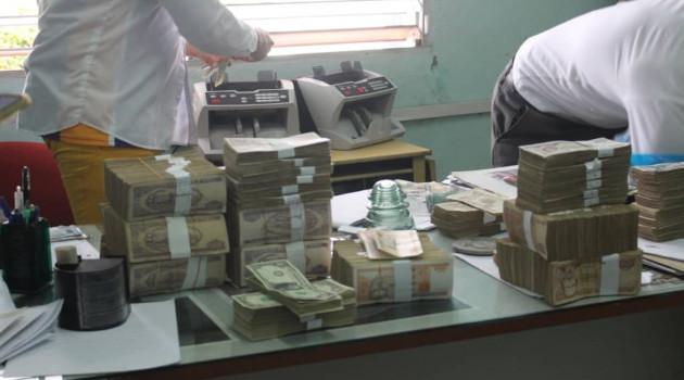 Efectivo incautado durante la investigación en Villa Clara. /Foto: Minint